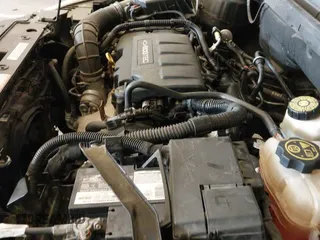 2013 Chevrolet Cruze 2LT z VIN 1G1PE5SB1D7109990, wystawiony jako IAAI lot #42479341 z przebiegiem 109 765 mil mil oraz . Historia ofert i sprzedaży dostępna na DreamBid. Obrazek 19.