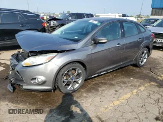 2013 Ford Focus SE z VIN 1FADP3F28DL333256, wystawiony jako Copart lot #60438255 z przebiegiem 102 226 mil mil oraz Czysty tytuł • Clean title. Historia ofert i sprzedaży dostępna na DreamBid. Obrazek 1.
