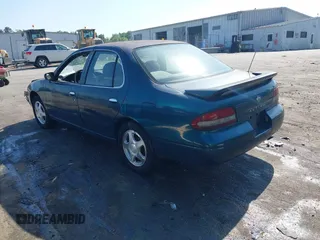 1997 Nissan Altima XE z VIN 1N4BU31D1VC199720, wystawiony jako IAAI lot #42061192 z przebiegiem 312 370 mil mil oraz . Historia ofert i sprzedaży dostępna na DreamBid. Obrazek 3.