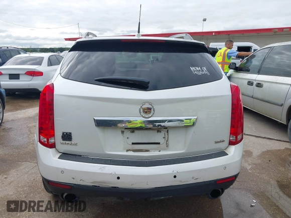 2013 Cadillac SRX Performance Collection z VIN 3GYFNDE38DS542736, wystawiony jako IAAI lot #42398648 z przebiegiem 266 059 mil mil oraz . Historia ofert i sprzedaży dostępna na DreamBid. Obrazek 16.