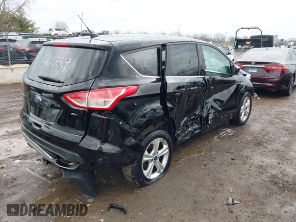2016 Ford Escape SE with VIN 1FMCU0G78GUB56029, listed as a IAAI auction lot 41904627 with 102,685 mi miles. Bid and sale history available at carsss.com. Image 4.