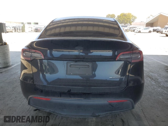2024 Tesla Model Y Long Range с VIN 7SAYGDEE8RF983280, выставлен на аукционе Copart как лот 55417555 с пробегом 52 273 миль миль и Списание • Salvage title. История ставок и продаж доступна на DreamBid. Изображение 6.