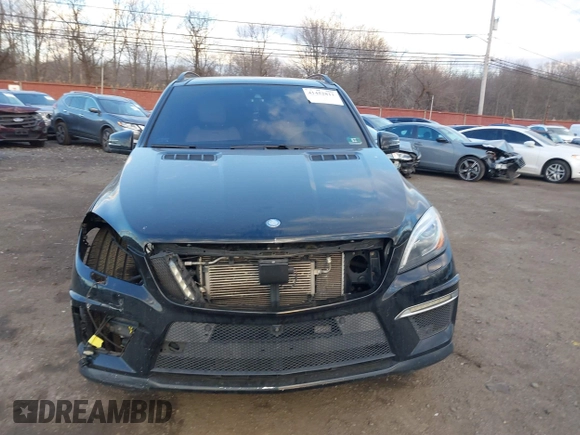 2014 Mercedes-Benz M 63 AMG z VIN 4JGDA7EBXEA306024, wystawiony jako IAAI lot #41452811 z przebiegiem 98 510 mil mil oraz . Historia ofert i sprzedaży dostępna na DreamBid. Obrazek 12.