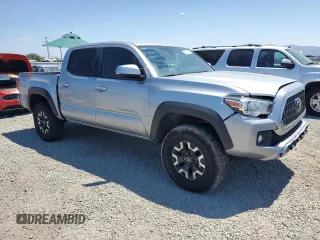 2018 Toyota Tacoma SR with VIN 3TMCZ5AN6JM129370, listed as a Copart auction lot 63042425 with 65,189 mi miles and Salvage title. Bid and sale history available at DreamBid. Image 4.