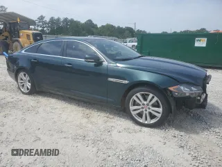 2017 Jaguar XJ Portfolio with VIN SAJWJ2GD7H8W11167, listed as a Copart auction lot 57103195 with 17,355 mi miles and Salvage title. Bid and sale history available at DreamBid. Image 4.