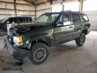1995 Jeep Grand Cherokee Limited with VIN 1J4GZ78Y2SC723898, listed as a Copart auction lot 54142035 with 173,454 mi miles and Salvage Title. Bid and sale history available at carsss.com. Image 1.