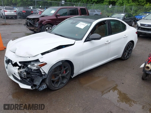 2021 Alfa Romeo Giulia Ti Sport with VIN ZARFAMBN9M7640461, listed as a IAAI auction lot 42329442 with 43,266 mi miles and . Bid and sale history available at DreamBid. Image 2.
