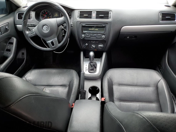 2014 Volkswagen Jetta SE with VIN 3VWD17AJ0EM314456, listed as a Copart auction lot 57380645 with 148,801 mi miles and Salvage title. Bid and sale history available at DreamBid. Image 8.