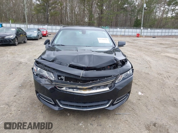 2018 Chevrolet Impala LT with VIN 2G1105S30J9115593, listed as a IAAI auction lot 41790526 with 144,843 mi miles and . Bid and sale history available at DreamBid. Image 12.