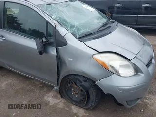 2011 Toyota Yaris with VIN JTDJT4K32B5325815, listed as a IAAI auction lot 41705028 with 137,509 mi miles. Bid and sale history available at carsss.com. Image 12.