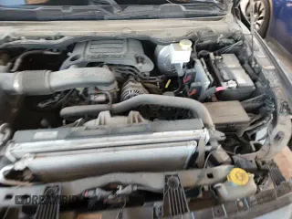 2021 Ram 1500 Rebel z VIN 1C6SRFLT0MN560172, wystawiony jako Copart lot #81118865 z przebiegiem 88 723 mil mil oraz Szkoda całkowita • Salvage title. Historia ofert i sprzedaży dostępna na DreamBid. Obrazek 13.