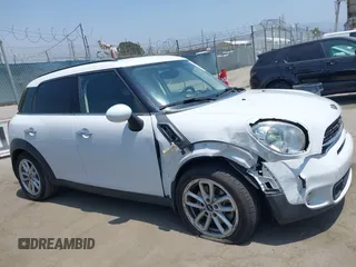 2016 MINI Countryman S with VIN WMWZC3C51GWT10248, listed as a IAAI auction lot 42359191 with 77,157 mi miles and . Bid and sale history available at DreamBid. Image 13.