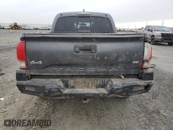 2017 Toyota Tacoma SR5 z VIN 3TMCZ5AN7HM094624, wystawiony jako Copart lot #58166405 z przebiegiem 84 877 mil mil oraz Szkoda całkowita • Salvage title. Historia ofert i sprzedaży dostępna na DreamBid. Obrazek 6.