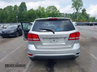 2012 Dodge Journey SXT z VIN 3C4PDCBGXCT324756, wystawiony jako IAAI lot #42422533 z przebiegiem 241 934 mil mil oraz . Historia ofert i sprzedaży dostępna na DreamBid. Obrazek 16.