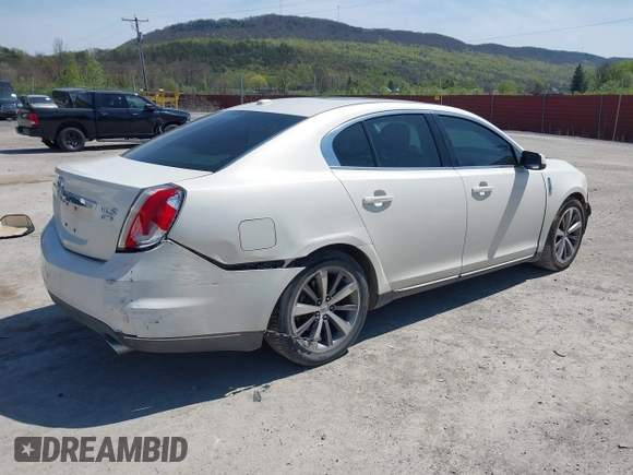 2009 Lincoln MKS with VIN 1LNHM94R09G602997, listed as a IAAI auction lot 42095272 with 122,682 mi miles and . Bid and sale history available at DreamBid. Image 4.