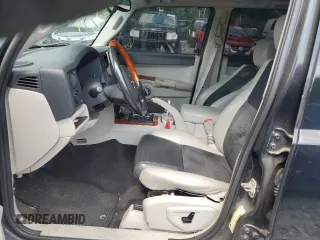 2007 Jeep Commander Overland z VIN 1J8HG68217C564894, wystawiony jako Copart lot #64382215 z przebiegiem 221 815 mil mil oraz Szkoda całkowita • Salvage title. Historia ofert i sprzedaży dostępna na DreamBid. Obrazek 7.