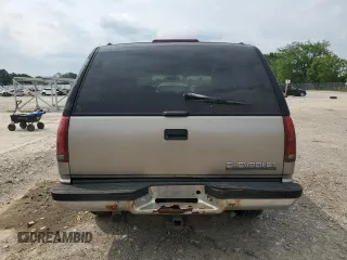1999 Chevrolet Tahoe Z71 with VIN 1GNEK13R6XJ301562, listed as a Copart auction lot 59684595 with 200,561 mi miles and Salvage title. Bid and sale history available at DreamBid. Image 6.