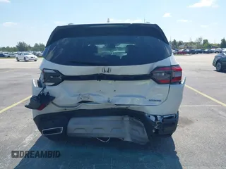 2024 Honda Pilot Touring z VIN 5FNYG2H72RB016937, wystawiony jako IAAI lot #42137854 z przebiegiem 18 028 mil mil oraz . Historia ofert i sprzedaży dostępna na DreamBid. Obrazek 6.