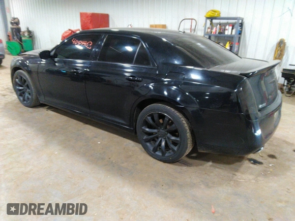 2014 Chrysler 300 S with VIN 2C3CCABG2EH343503, listed as a IAAI auction lot 40934463 with 128,876 mi miles and . Bid and sale history available at carsss.com. Image 3.