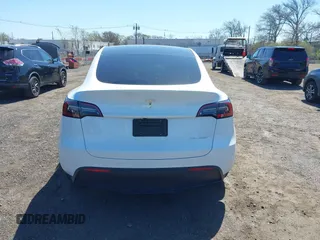2023 Tesla Model Y Long Range with VIN 7SAYGDEE3PA201719, listed as a IAAI auction lot 42048816 with Not Provided miles and . Bid and sale history available at DreamBid. Image 16.