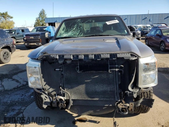 2012 Ford F-250 XL with VIN 1FT7W2A68CED01876, listed as a Copart auction lot 79629364 with 114,793 mi miles and Salvage title. Bid and sale history available at DreamBid. Image 5.
