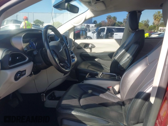 2021 Chrysler Pacifica Hybrid Touring L with VIN 2C4RC1L76MR581285, listed as a IAAI auction lot 42303222 with 77,808 mi miles and . Bid and sale history available at DreamBid. Image 5.