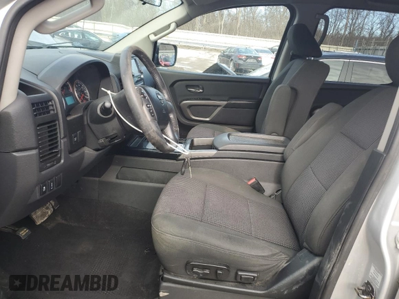 2015 Nissan Titan Pro-4X with VIN 1N6AA0EC1FN512072, listed as a Copart auction lot 85733174 with 92,460 mi miles and Salvage title. Bid and sale history available at DreamBid. Image 7.