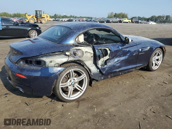 2014 BMW Z4 sDrive35is with VIN WBALM1C57EE634167, listed as a Copart auction lot 69088044 with 68,620 mi miles and Salvage title. Bid and sale history available at DreamBid. Image 3.