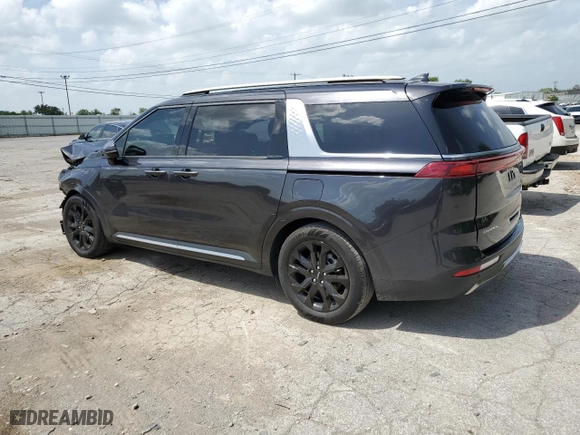 2023 Kia Carnival SX Prestige with VIN KNDNE5H32P6277047, listed as a Copart auction lot 65746354 with 23,873 mi miles and Salvage Title. Bid and sale history available at carsss.com. Image 2.