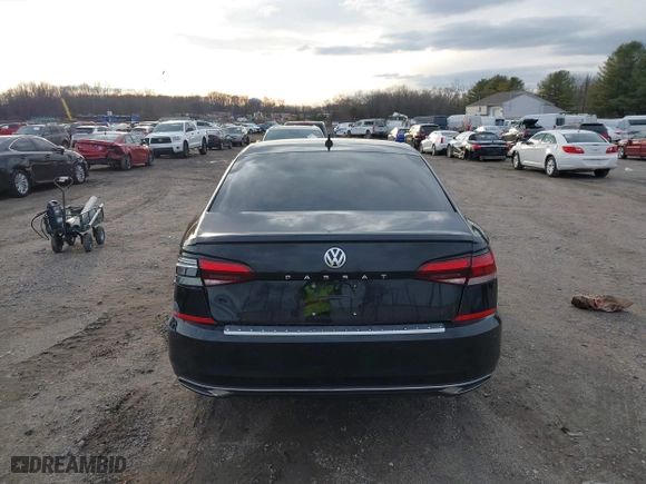 2021 Volkswagen Passat 2.0T SE with VIN 1VWSA7A34MC019031, listed as a IAAI auction lot 41150221 with 50,796 mi miles. Bid and sale history available at carsss.com. Image 15.