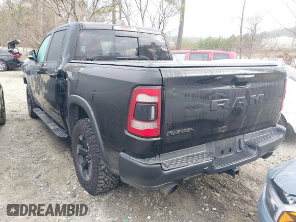 2019 Ram 1500 Rebel with VIN 1C6SRFLTXKN580782, listed as a IAAI auction lot 41498027 with 83,669 mi miles and . Bid and sale history available at DreamBid. Image 3.