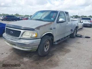 2002 Ford F-150 XL with VIN 2FTRX07242CA45481, listed as a IAAI auction lot 42097689 with 1 mi miles. Bid and sale history available at carsss.com. Image 2.