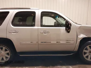 2014 GMC Yukon Denali with VIN 1GKS2EEF0ER134804, listed as a IAAI auction lot 41582709 with 142,192 mi miles. Bid and sale history available at carsss.com. Image 14.