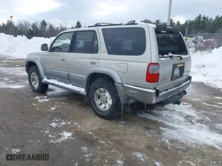 1998 Toyota 4Runner Limited with VIN JT3HN87RXW0144093, listed as a IAAI auction lot 41520901 with 205,623 mi miles. Bid and sale history available at carsss.com. Image 3.