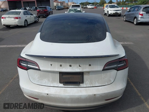 2019 Tesla Model 3 Mid Range with VIN 5YJ3E1EA6KF396946, listed as a IAAI auction lot 41123058 with 69,013 mi miles and . Bid and sale history available at carsss.com. Image 17.