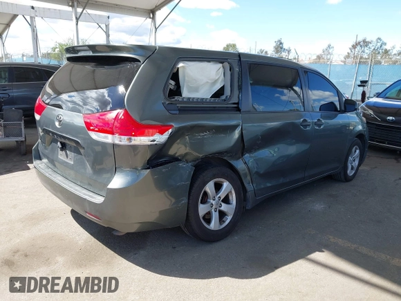 2014 Toyota Sienna L with VIN 5TDZK3DC6ES441417, listed as a IAAI auction lot 41950033 with 170,804 mi miles. Bid and sale history available at carsss.com. Image 4.