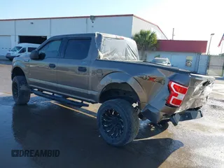 2018 Ford F-150 XL with VIN 1FTEW1EG1JFC31794, listed as a IAAI auction lot 41304111 with 129,058 mi miles and . Bid and sale history available at carsss.com. Image 3.