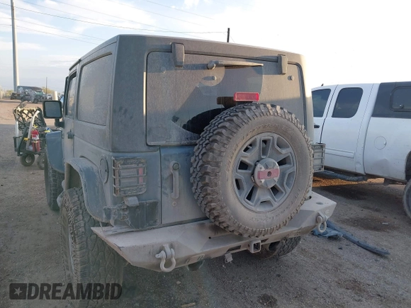 2014 Jeep Wrangler Sport with VIN 1C4AJWAG0EL326774, listed as a IAAI auction lot 41691784 with 98,696 mi miles and . Bid and sale history available at DreamBid. Image 3.