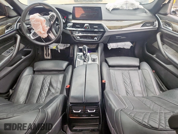 2018 BMW 5 Series 540i xDrive with VIN WBAJE7C52JWD52730, listed as a Copart auction lot 60297425 with 104,208 mi miles and Salvage title. Bid and sale history available at DreamBid. Image 8.