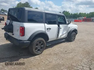 2021 Ford Bronco with VIN 1FMDE5BH6MLA80102, listed as a IAAI auction lot 42126680 with 67,913 mi miles and . Bid and sale history available at DreamBid. Image 4.