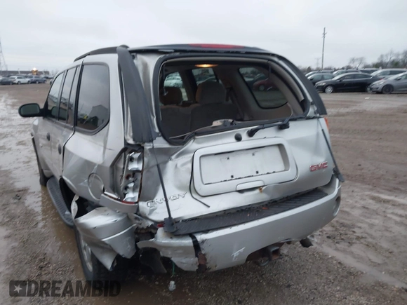 2006 GMC Envoy SLT with VIN 1GKDT13SX62342147, listed as a IAAI auction lot 40873738 with 159,092 mi miles. Bid and sale history available at carsss.com. Image 6.
