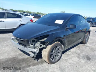 2024 Tesla Model Y with VIN 7SAYGDED2RA331436, listed as a IAAI auction lot 41713562 with NaN miles. Bid and sale history available at carsss.com. Image 19.