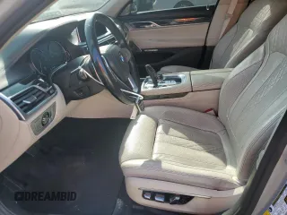 2016 BMW 7 Series 750i with VIN WBA7F0C50GGM20697, listed as a Copart auction lot 78850524 with 126,518 mi miles and Salvage Title. Bid and sale history available at carsss.com. Image 7.
