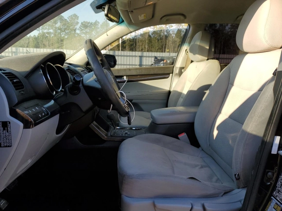 2013 Kia Sorento LX with VIN 5XYKT3A69DG345242, listed as a Copart auction lot 50469915 with 154,112 mi miles and Salvage title. Bid and sale history available at DreamBid. Image 7.