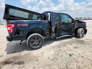 2018 Ford F-150 XL with VIN 1FTEW1E57JFC39493, listed as a Copart auction lot 61781395 with 129,871 mi miles and Salvage title. Bid and sale history available at DreamBid. Image 3.