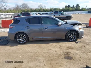 2015 Lexus CT 200h z VIN JTHKD5BH5F2224325, wystawiony jako IAAI lot #41095553 z przebiegiem 92 591 mil mil oraz . Historia ofert i sprzedaży dostępna na DreamBid. Obrazek 13.