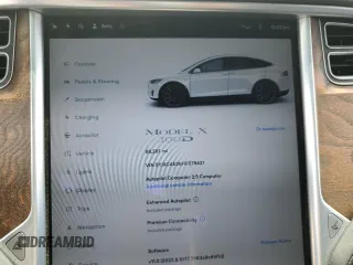 2017 Tesla Model X 90D with VIN 5YJXCAE26HF079421, listed as a Copart auction lot 47889005 with 88,281 mi miles and Salvage Title. Bid and sale history available at DreamBid. Image 9.