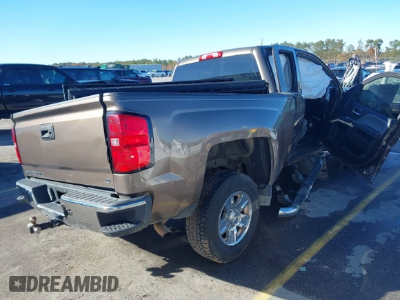 2014 Chevrolet Silverado 1500 LT with VIN 1GCRCREH5EZ165367, listed as a IAAI auction lot 41076729 with 130,425 mi miles and . Bid and sale history available at DreamBid. Image 4.