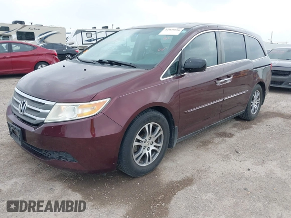 2012 Honda Odyssey EX-L with VIN 5FNRL5H61CB108301, listed as a IAAI auction lot 41939536 with 225,476 mi miles and . Bid and sale history available at DreamBid. Image 19.