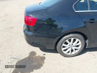 2014 Volkswagen Jetta Sedan SE w/Connectivity/Sunroof PZEV with VIN 3VWD17AJ8EM434456, listed as a IAAI auction lot 42099297 with 92,773 mi miles. Bid and sale history available at carsss.com. Image 12.
